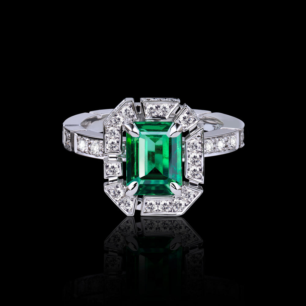 Regina diamond halo ring with Zambian green emerald in 18ct white gold by Stefano Canturi Regina diamond halo ring with Zambian green emerald in 18ct white gold by Stefano Canturi