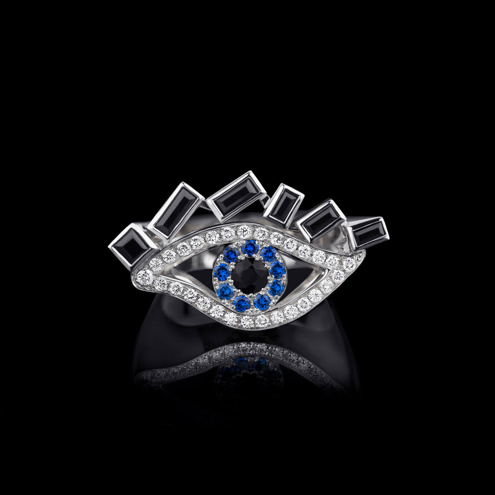 Cubism Eye ring set in 18ct white gold with Australian black sapphires, diamonds, spinel gemstones by Stefano Canturi. Cubism Eye ring set in 18ct white gold with Australian black sapphires, diamonds, spinel gemstones by Stefano Canturi.