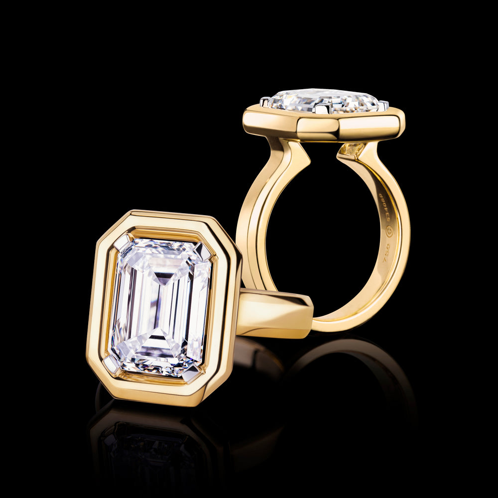 Athena halo emerald cut diamond ring in 18ct yellow gold by Stefano Canturi Athena halo emerald cut diamond ring in 18ct yellow gold by Stefano Canturi
