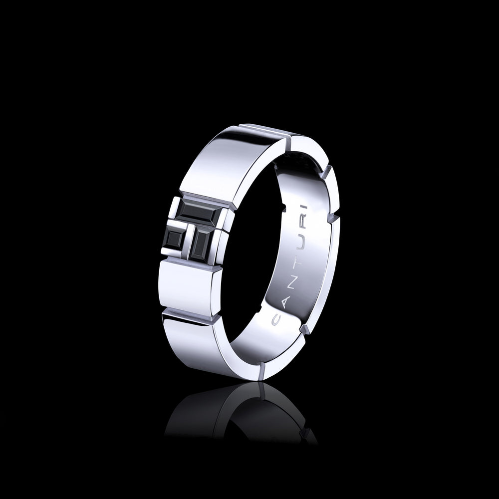 Cubism set Australian black sapphires on Eternal style ring set in 18ct gold by Stefano Canturi. Cubism set Australian black sapphires on Eternal style ring set in 18ct gold by Stefano Canturi.