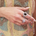 Stella diamond and Australian black sapphire ring and Odyssey diamond Star ring in 18ct white gold by Stefano Canturi Stella diamond and Australian black sapphire ring and Odyssey diamond Star ring in 18ct white gold by Stefano Canturi