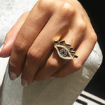 Cubism Eye ring set in 18ct yellow gold with Australian black sapphires, diamonds, spinel gemstones by Stefano Canturi. Cubism Eye ring set in 18ct yellow gold with Australian black sapphires, diamonds, spinel gemstones by Stefano Canturi.