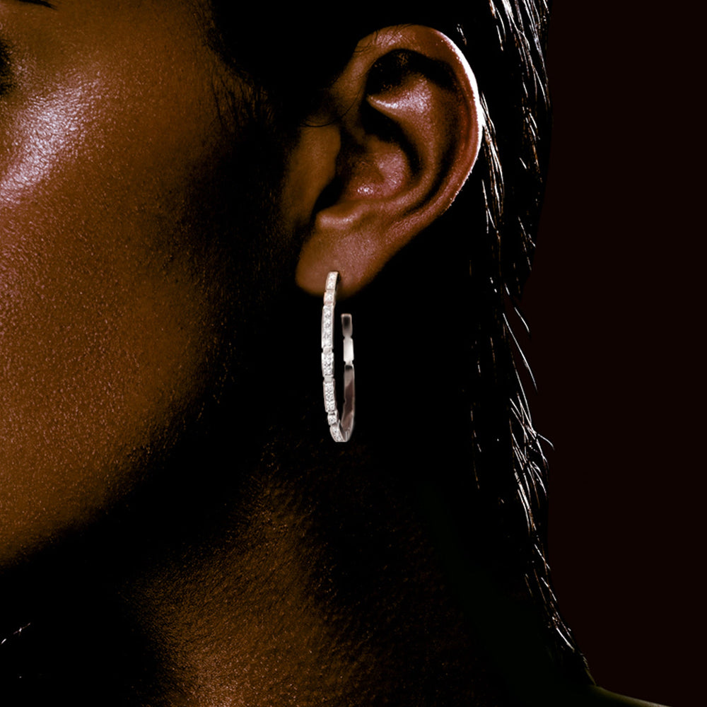 egina Diamond Hoop Earrings by Canturi – Exquisite handcrafted hoop earrings adorned with brilliant diamonds, offering timeless elegance and luxury. Handcrafted in Australia.