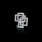Geometric diamond and Zambian green emerald brooch by Stefano Canturi