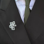 Geometric diamond and Zambian green emerald brooch by Stefano Canturi