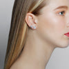 Cubism extra large diamond earrings and Regina diamond earrings in 18ct white gold by Stefano Canturi