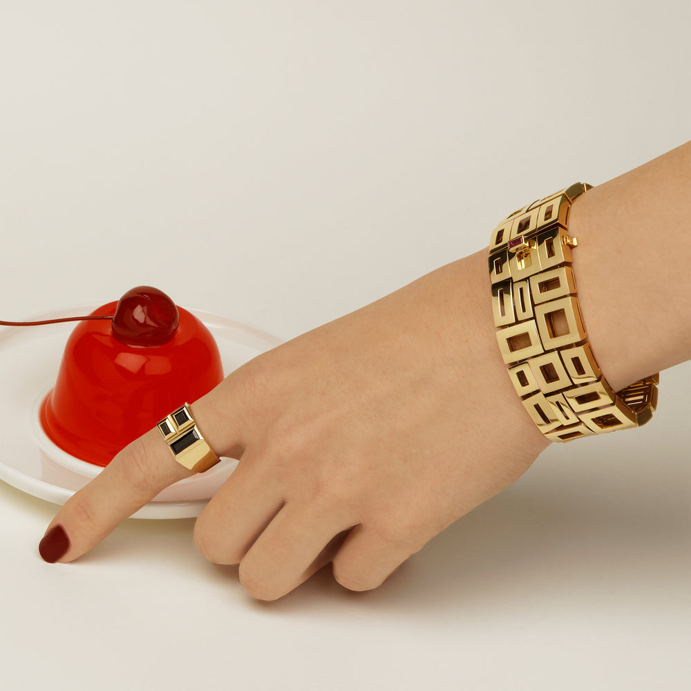 Geometric cuff in 18ct yellow gold and Cubism Signet ring with black spinel gemstones by Stefano Canturi
