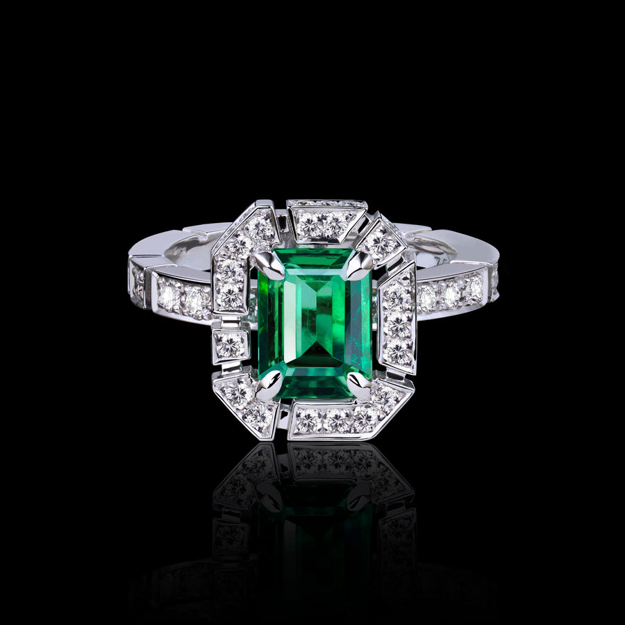 Regina diamond halo ring with Zambian green emerald in 18ct white gold by Stefano Canturi