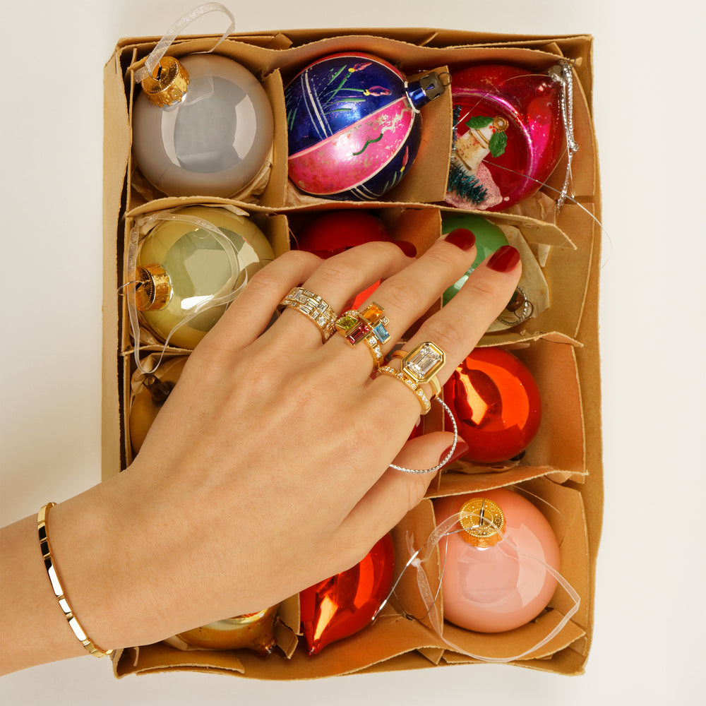 Cubism classic diamond ring set in 18ct yellow gold Athena 18ct yellow gold 3.01ct Emerald cut diamond ring Cubism Colourburst gemstone ring  in 18ct yellow gold Regina diamond ring in 18ct yellow gold and Eternal Mini bangle in 18ct yellow gold by Stefano Canturi