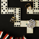 Cubism Signet black spinel ring in 18ct yellow gold Athena 3.01ct emerald cut diamond ring set in yellow gold and Geometric diamond and Zambian emerald brooch in white gold by Stefano Canturi