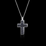 Cubism cross necklace featuring baguette and carré cut Australian black sapphires set in 18ct white gold by Stefano Canturi