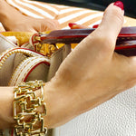 Affinity 3 row woven bracelet in yellow gold by Stefano Canturi