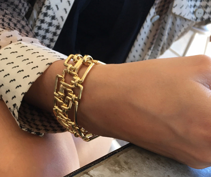 Affinity 3 row woven bracelet in yellow gold by Stefano Canturi