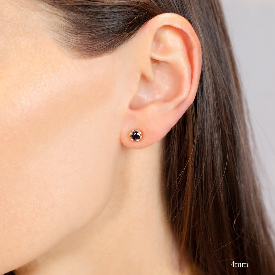Regina 4mm stud earrings featuring Australian black sapphires in 18ct pink gold by Stefano Canturi