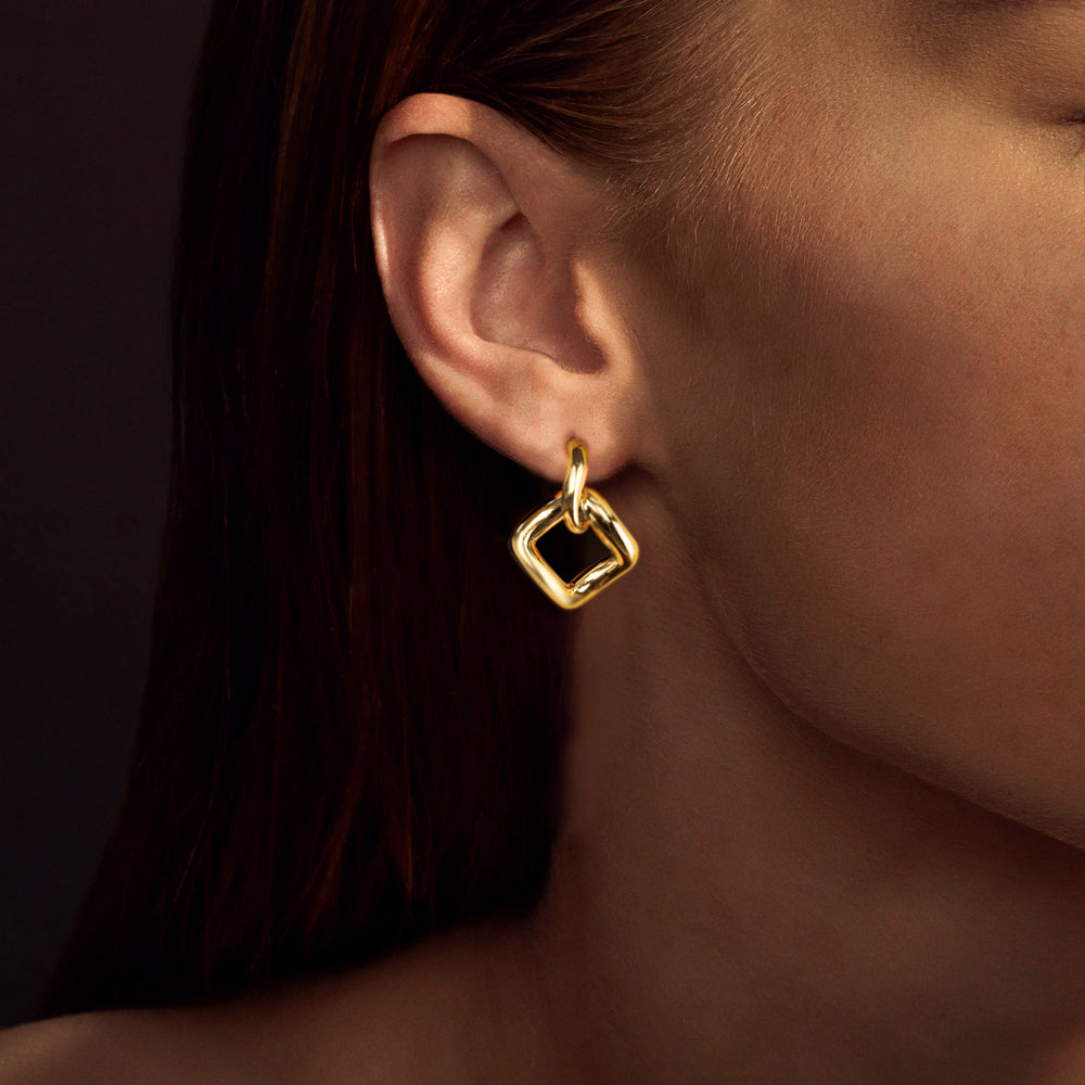 Affinity interlink earrings in 18ct yellow gold by Stefano Canturi