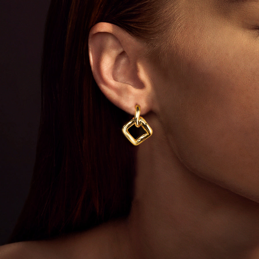 Affinity interlink earrings in 18ct yellow gold by Stefano Canturi