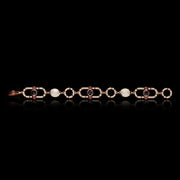 Regina diamond, ruby, Australian black sapphire, moonstone bracelet in 18ct pink gold by Stefano Canturi